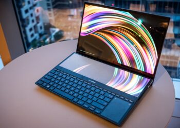 Shocked commuters gawp as woman brings desktop computer on First Class